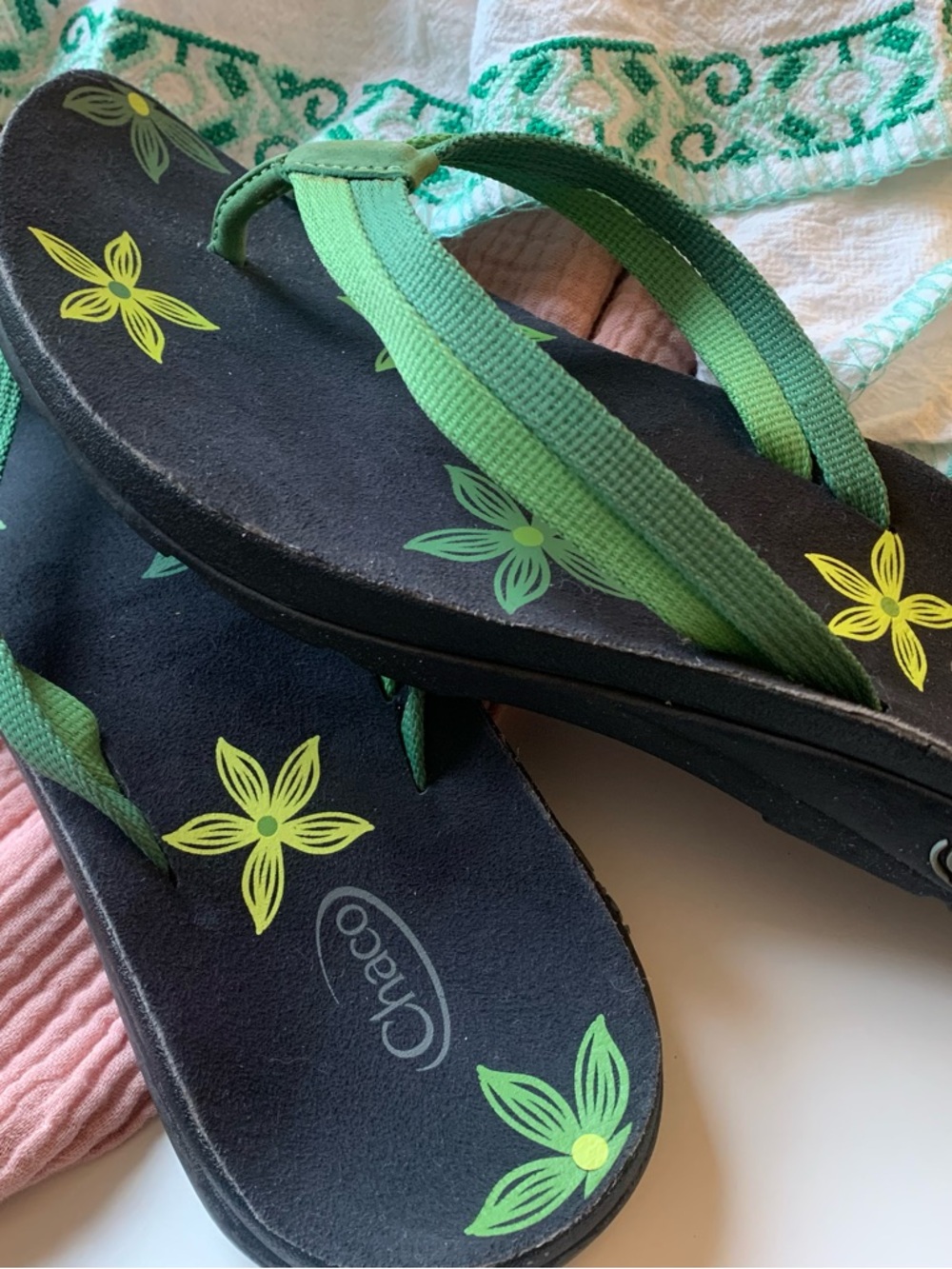 Chaco Black Flip Flops with Green and Yellow Floral Print